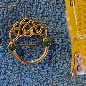 Gold colored Celtic Scottish brooch with two green stones